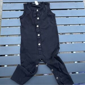 Kate Quinn black button onesie